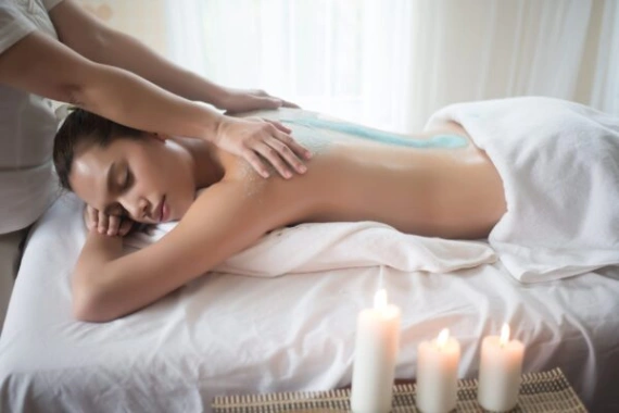 Beautiful young woman in spa