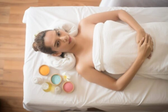 Beautiful young woman in spa